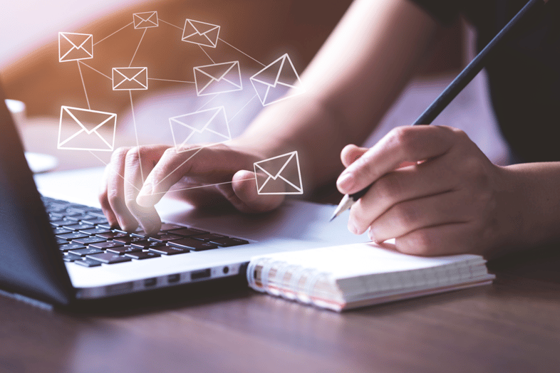 laptop-emails-and writing notes